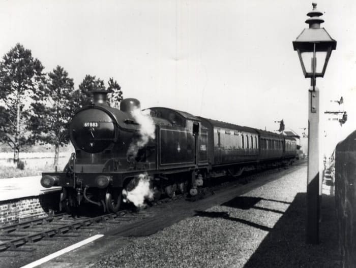 Battersby - Class A8 4-6-2 tank loco 69885 of Scarborough runs into the station with a mixed train of non-corridor passenger stock. The engine will have to run round her train before taking her out either north to Middlesbrough or east for Whitby