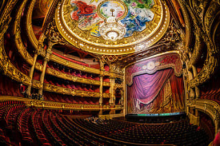 The marvelous stage of the Opera Garneir. The elegant seats have allowed spectators to enjoy the performances for over a hundred years.