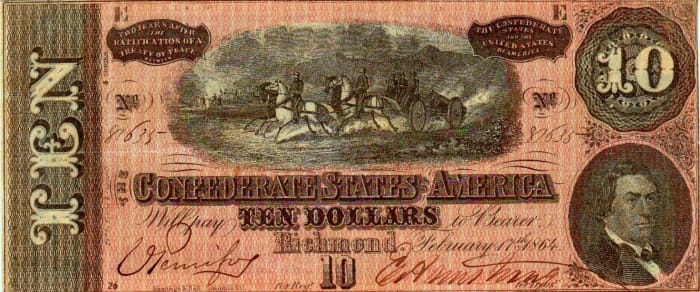 A $10.00 Confederate States of America Currency. With a team of horses pulling cannon in the center, and R.M.T. Hunter to the right. This is the fifty series. With a lot of hand drawn workmanship.