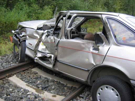Don's Ford Escort was crushed by an eighteen wheeler, pinning his legs under the dashboard. Jaws of Life were required to free him from the wreckage. (Not the actual wreckage photo.)