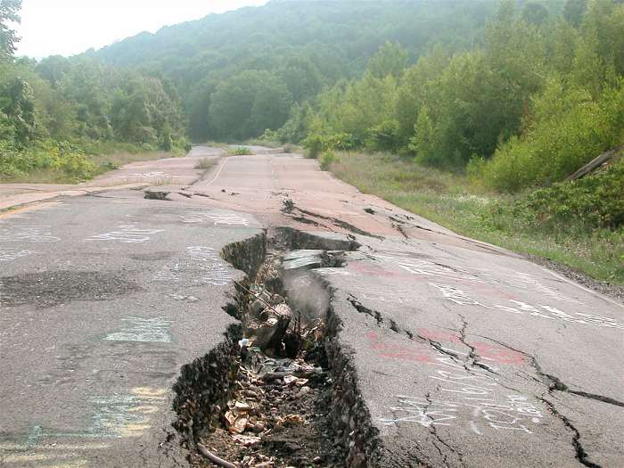 Smoke emanating from a fissure in the road on the abandoned section of highway 61 near Centralia, PA. An underground mine fire has been burning there since 1962.