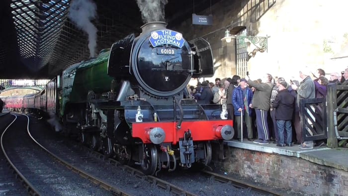 'Flying Scotsman', 60103 to friends, arrives at Pickering in March 2016 with a crowd of eager onlookers on and around the platform