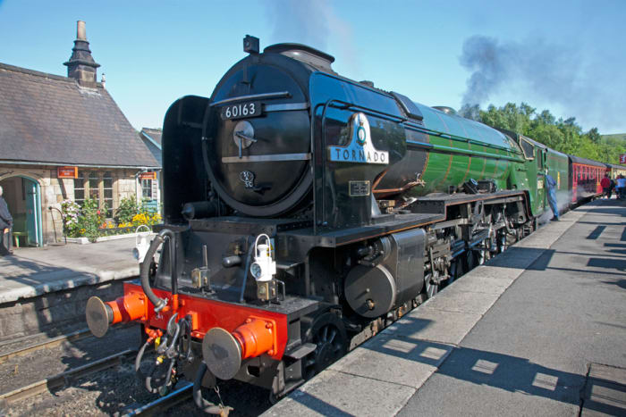 On a sunny March day, 2018 Peppercorn A1 60163 'Tornado' simmers on the 'up' platform at Grosmont with a train for Pickering