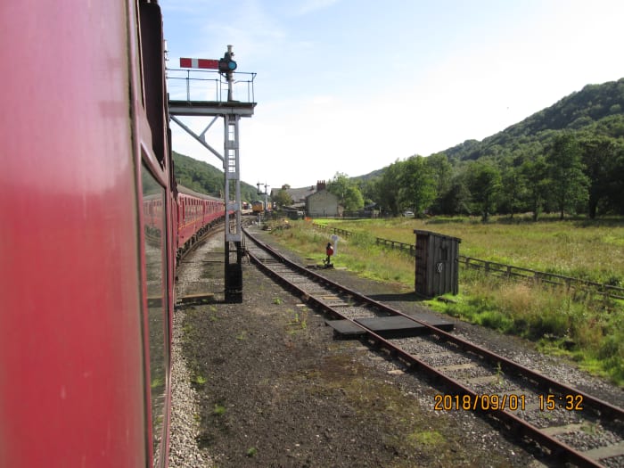 ... Goes to the signalling and telegraph department on the NYMR - here we pass the late LNER bracket-mounted advance starter at Levisham, the right-hand arm for any locomotives that might await the off from the siding on the right.