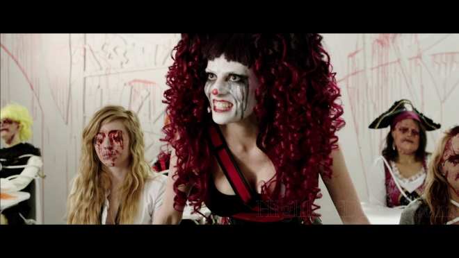 Dollface (Candice De Visser) loved torturing her classmates in school and now she gets to do it again in The Funhouse Massacre.