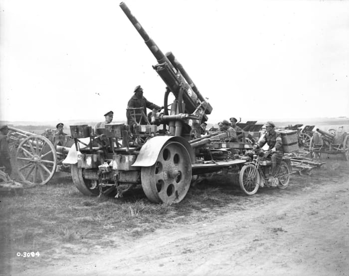 In the First World War British troops with a German 88mm Flak gun originally designed by Krupp as an anti-balloon gun.