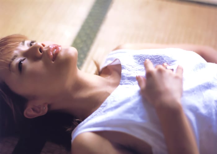 Is Yuko Nakazawa meditating in this photo? At the very least she is trying to relax herself and show her softer side.