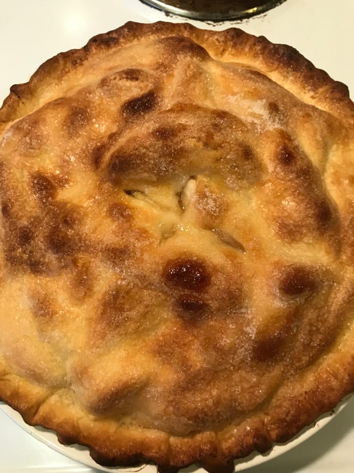 Perfectly browned pastry - but don't cut it! Let it cool completely, otherwise the juices will all run all over and the pie will look like it's been hacked with a saw. Trust me - I have to take extreme measures, and the kids still usually get them!