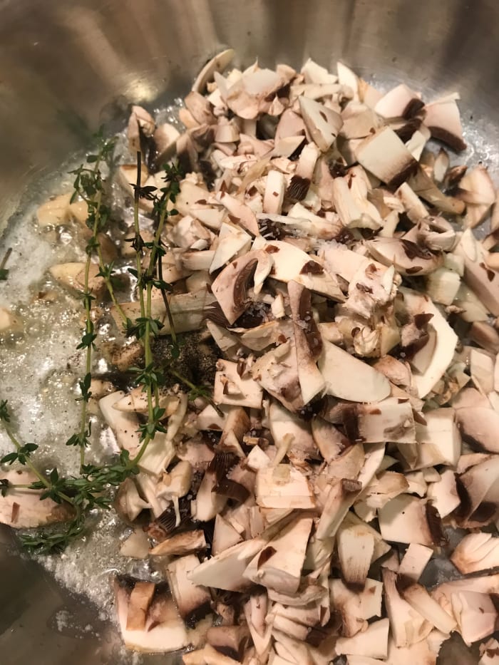 Saute the mushrooms with the salt, pepper, and thyme until they release their liquid. The thyme becomes beautifully fragrant.