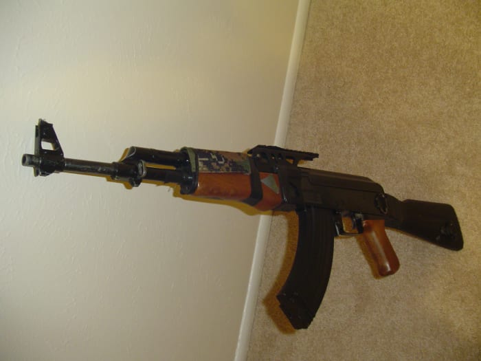 This is my Cyma CM.028 airsoft electric gun after 3 years of play. It is very beat up, but still works great!