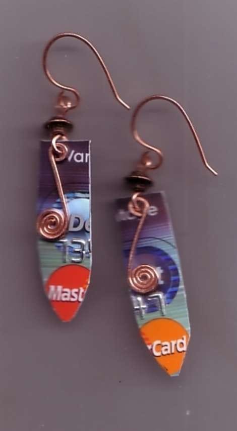 Stop. Don't pull out that credit card. If you need a little help keeping your spending habits in line, cut your credit or debit card into strips, add holes, a bit of trim and a pair of earwires, and dangle them from your ears.