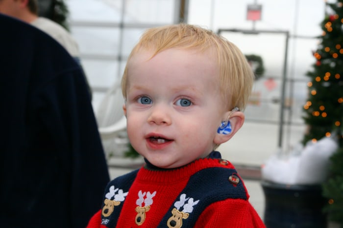 Hearing aids are necessary for a child's development of spoken language: unfortunately, most insurance companies consider this medical device a "lifestyle choice" and refuse to provide coverage. Families must seek funding from charities in the USA.