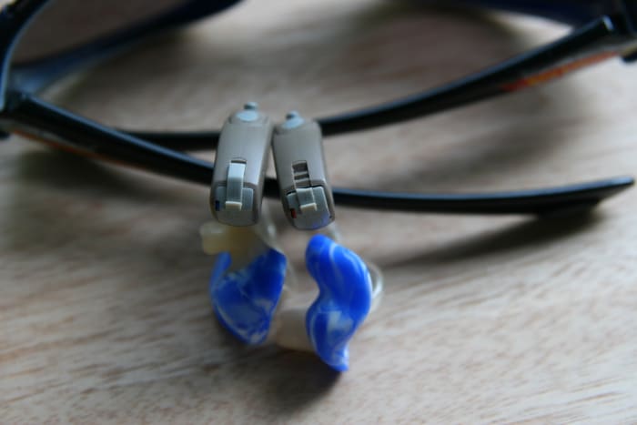 Children's hearing aids must be replaced at a faster rate than adult hearing aids. There are many programs to help assist with the high cost of these devices.