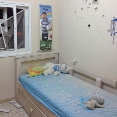 A child's bedroom in Israel, riddled with shrapnel from a missile launched by the Iranian funded Hamas government in Gaza City, in November, 2012.