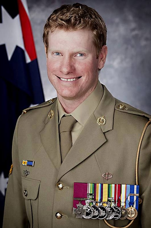 Australian Corporal Daniel Keighran VC. The Victoria Cross is the purple ribboned cross which can be seen on the left of this image