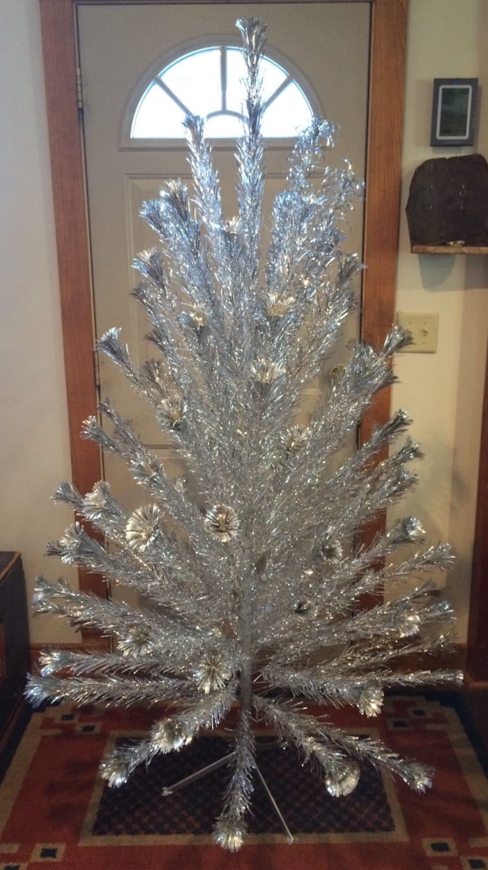 Built to last, The Vintage Aluminum Sparkler Pom Pom Christmas Tree by Star Band Co., Inc. of Portsmouth Virgina ... These trees were made by folks that really cared about the product they were making ...