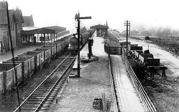 A train of coal empties pass South Cave station on the H&BR on the way south-west to the southern area of the widespread Yorkshire Coalfield