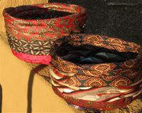 These lovely lined baskets look slouchy and sophisticated all at once. The creator uses several neckties in coordinating colors and sews them in coils. Even the base is made with neckties! Full the full tutorial on this page.