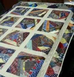 Crazy quilting is my absolute favorite kind of quilting and it makes for hours of fun simply looking at how the patterns (or lack of patterns) come together. This crazy quilt is a very fun use of neckties, made more crazy with a variety of patterns.