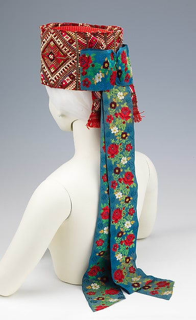 Traditional Hungarian headdress for women during the latter part of the 1800's. Heavily embroidered on both the hat and its streamers.