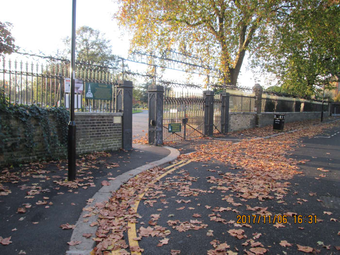 Seen from Whitta Road going east to the railway station, the iron railings and gates are well maintained, closing times posted on a board inside the cemetery