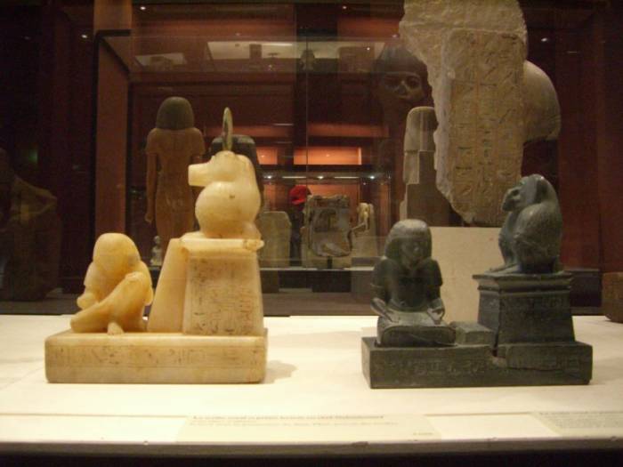 Thoth statues in the Louvre. Scribes and government officials often commissioned portraits of themselves writing with the Thoth-baboon watching over them in approval: literacy was a sign of status.