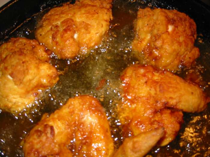 Fry your breaded chicken in a 350 degree pre heated home deep fryer for 15-18 minutes. Be sure to cut the largest piece to make sure all your chicken is done.
