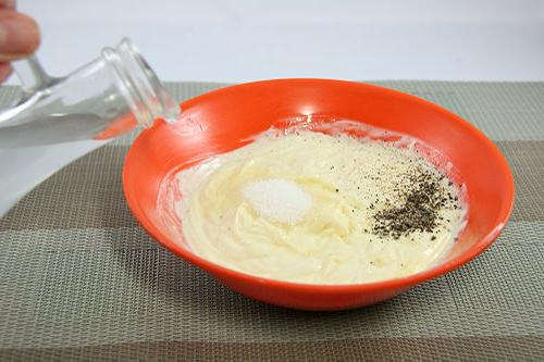 You'll want to mix up your cole slaw dressing ingredients in a large bowl. See above for how to make your cole slaw dressing.