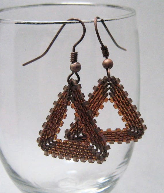 You can attach your earring or pendant loops at the triangle points or in the middle of the triangle sides. Also consider different types of wire for your earrings and different stringing options for pendants and necklaces.