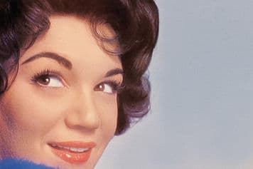 Connie Francis recorded the song in Italian, Neapolitan ( Portami Con te) and in Spanish ( Llevame la luna)