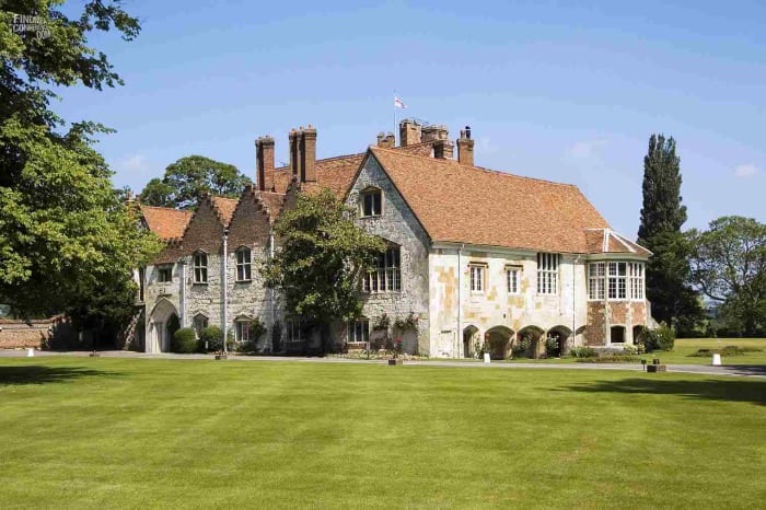 Ghostly Bisham Abbey is said to be cursed! (Pronounced Bis-ham) from the word bis hamlet. bis meaning 2 and ham short for hamlet or small gathering of houses.