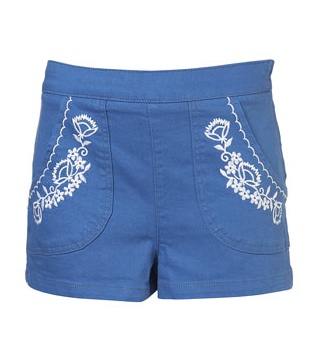 A high-waisted walking short beautified with south of the border style embroidery.