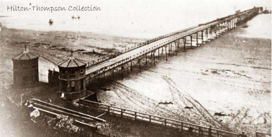 Saltburn pier, 1869 at low tide. At one stage there was a dance floor at the end and a band to play for dancers
