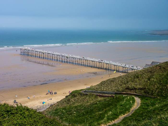 Seen from the north (Marske) side, Saltburn pier hardly reaches to the tide mark when it's at its lowest ebb