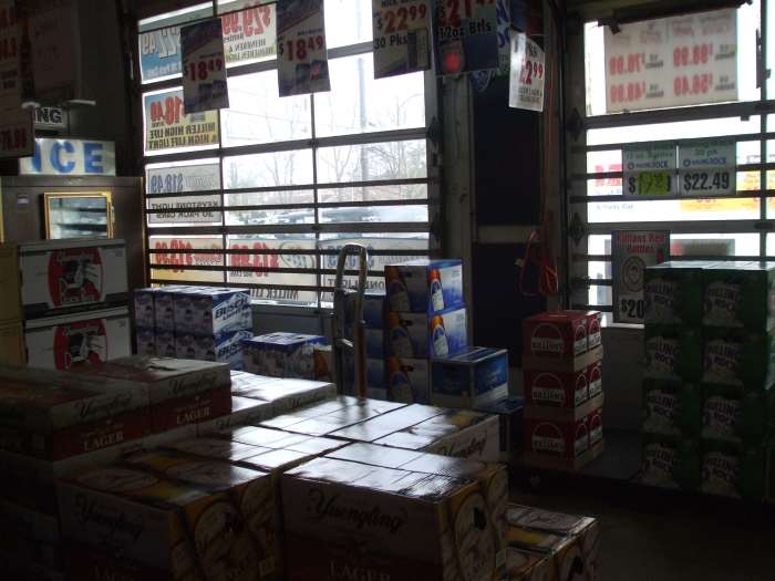 Frattaroli's Beer Outlet does not hide the fact that it was once a garage. Why not use the natural light coming in the garage doors?