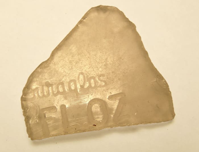 Exhibit A: Glass found on the creek from the Owens-Illinois Glass Co. dated 1940 to mid 1950's.
