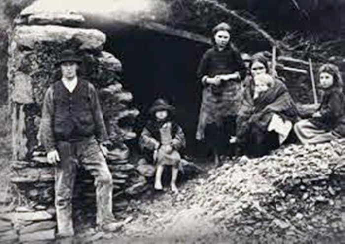Itinerant workers struggling to feed their family due to the Irish potato famine of the 19th century.
