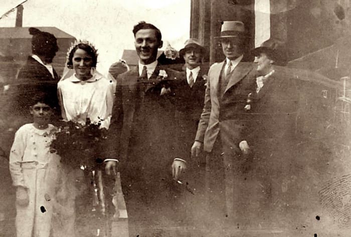 Mum's brother, Ken Trigg, is the young boy on the left, at a family wedding in the 1930s. It was the wedding of my grandad Frank Trigg's younger brother, Charlie, to Kitty. My great grandma (grandad's mum) is on the right.