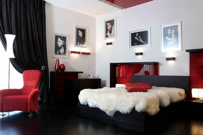 The use of black and white along with some dramatic colors like red give this room a dramatic effect. Add some pictures to the walls and you have yourself a masterpiece master bedroom design.
