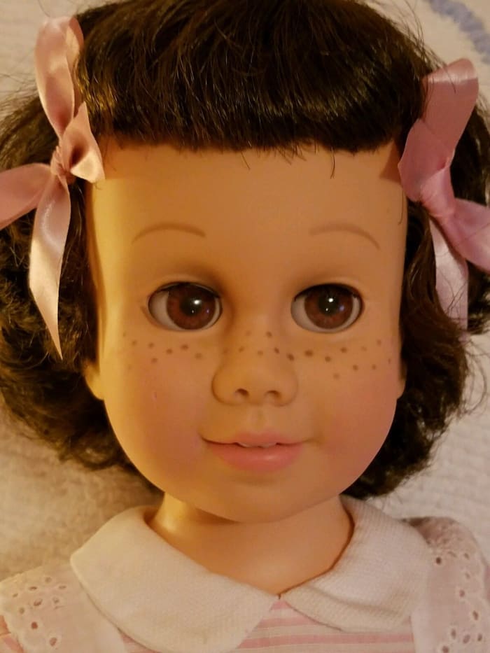 Chatty Cathy, she is a brunette, with brown eyes, and she is wearing a sweet pink peppermint outfit. This one has a soft head ...
