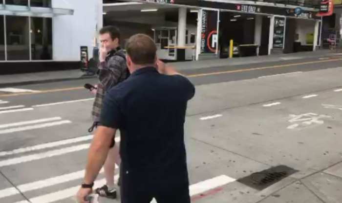 Jones stalked this guy on the streets of Seattle, then turned to chase down this next dude. Dude and his coffee didn't take it so kindly.