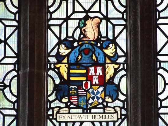 The Holte Family Crest, complete with Red Hand. The motto means "Lifting up the Lowly", as opposed to murdering them.