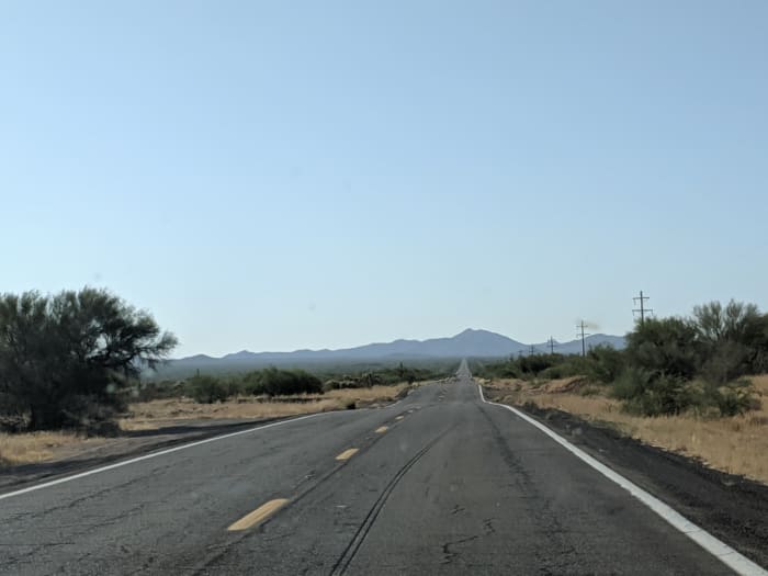 Driving Across Tohono O'Odham Reservation. Land on either side of highway is mostly empty desert rangeland that extends on the left south to Mexico and right north to Interstate . 8.