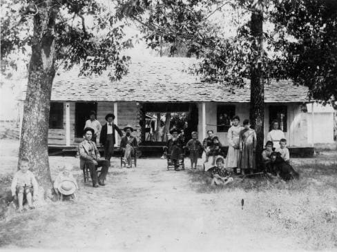 Skullyville - The Choctaw Agency building - The Tom Ainsworth family when he owned the building in the 1880's