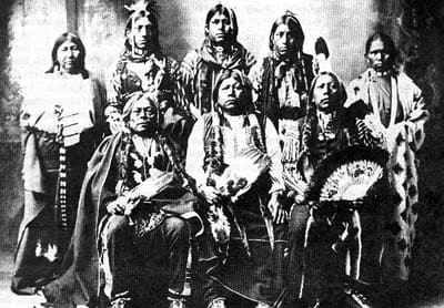 1898 Tonkawa Indians-Photo credit: http://commons.wikimedia.org/wiki/File:Tonkawa_chiefs.jpg Tonkawas photographed by Rhinehart in 1898. Standing L-R, Winnie Richards, John Rush Buffalo, William Stevens, John Allen, and Mary Richards. Seated L-R Joh