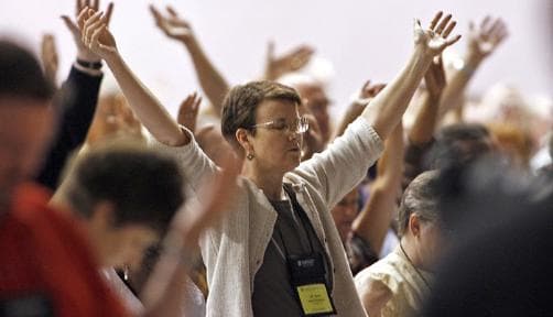 ELCA members pray for guidance during their 2009 Convention in Minneapolis, Minnesota. Photo by: Marlin Levison, Star Tribune