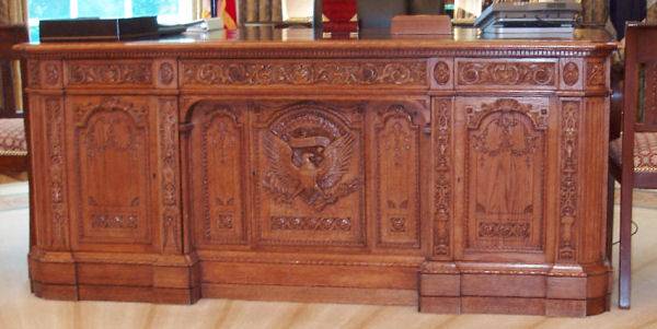 The panel face of the Resolute Desk, given to the United States by Queen Victoria. Presidents have used it off and on since then. President Clinton brought it back into the Oval Office and has been used by the presidents since then.