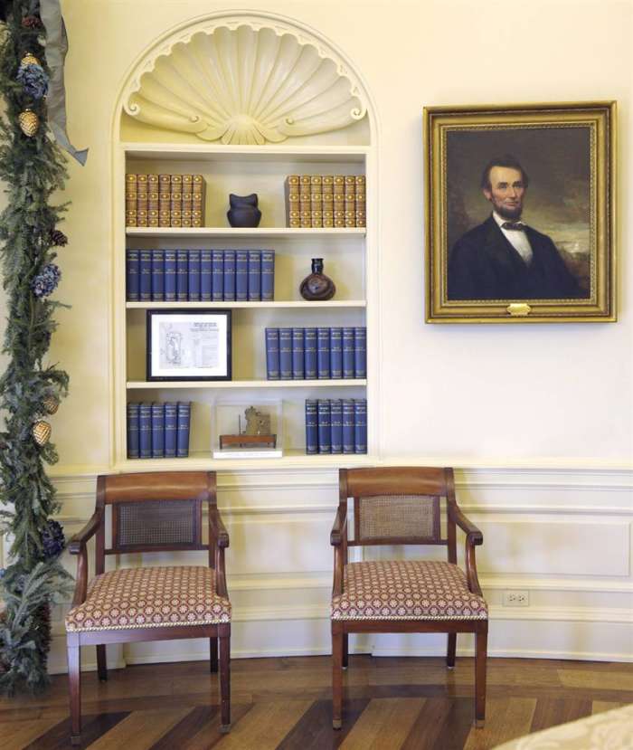 The likeness of Abraham Lincoln graced the Bush Oval Office two times: first, this George Story painting of Abraham Lincoln (above) along with a bust of the 16th president by Augustus St. Gaudens (below).