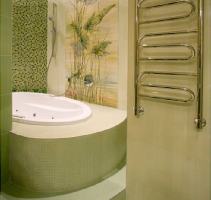 This bathroom, done in a relaxing, soothing Spa Green color, provides a welcome respite from the stresses of daily life.
