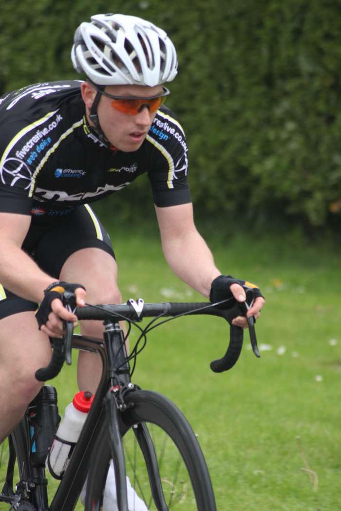 A rider from the UK based Clay Cross RT looking professional in his sponsored Casco cycling helmet.